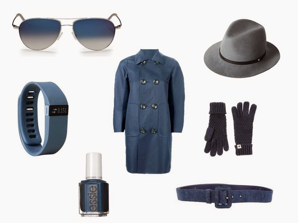 Smoky blue coat with sunglasses, Fitbit, nail polish, fedora, gloves and a belt in coordinating blue