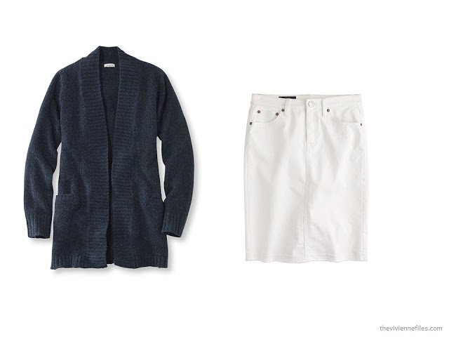 A basic navy cardigan and white skirt offer many options in a capsule wardrobe