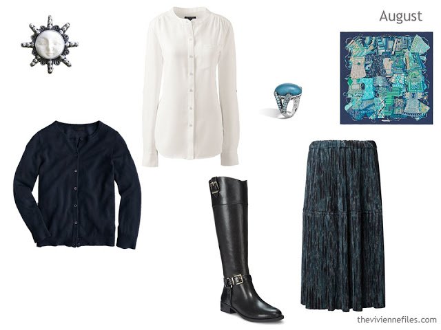 navy cardigan, cream blouse and bluegreen textured skirt