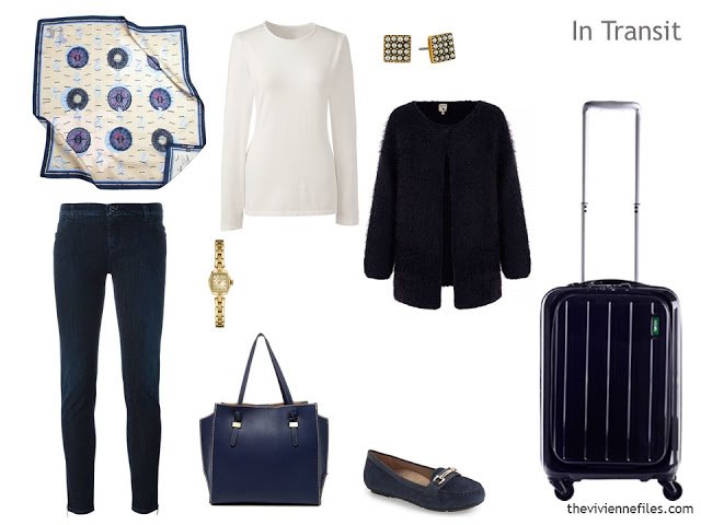 cool-weather travel outfit in navy and ivory