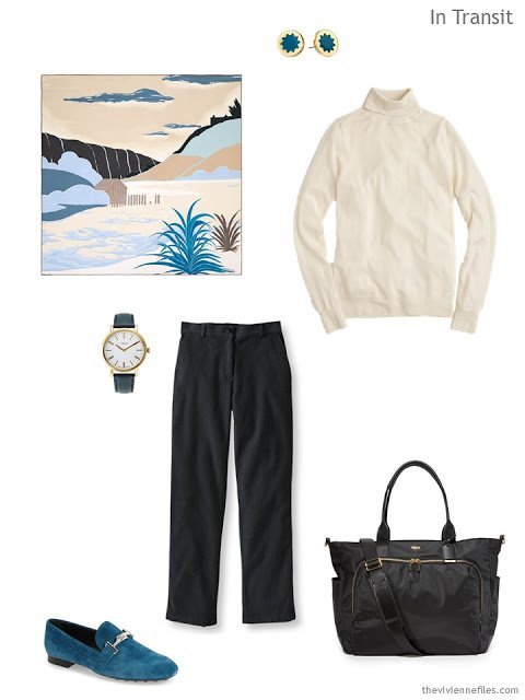 Classic travel outfit in cream and black, with teal accessories