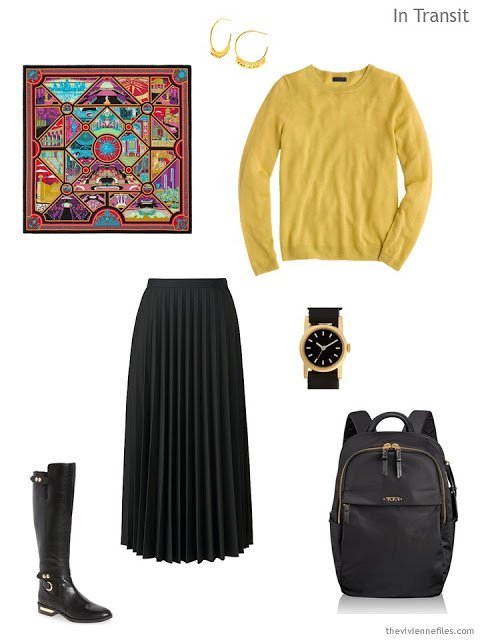 Classic travel outfit in black and yellow, with an Hermes scarf