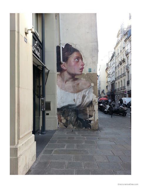 Paris street art woman from classical painting