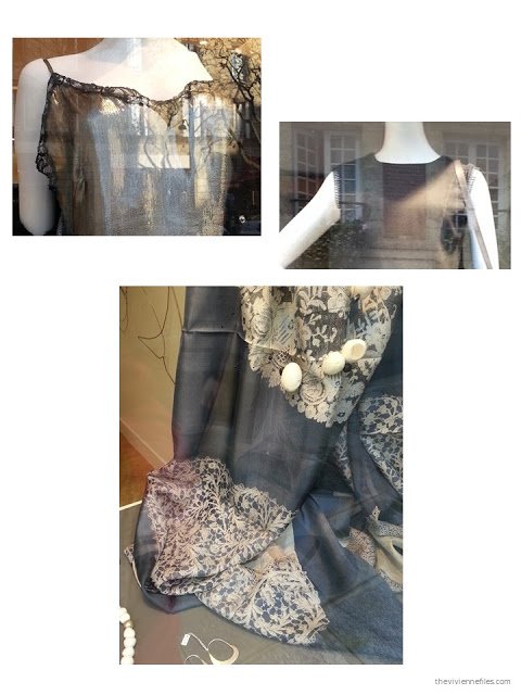 lace trim on garments, and a lace scarf, in the shop windows of Paris