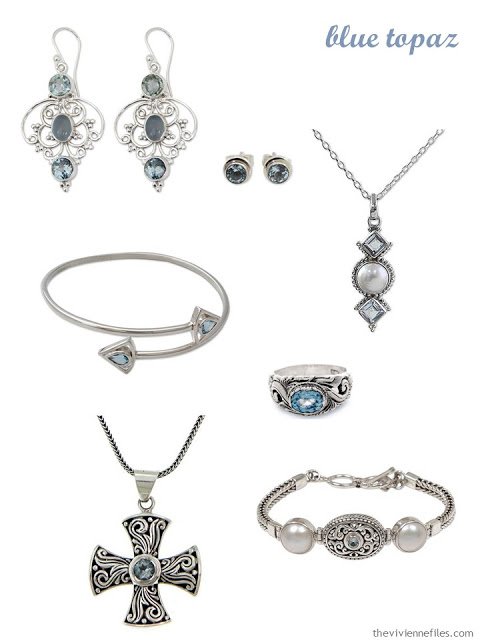 a family of seven pieces of blue topaz jewelry