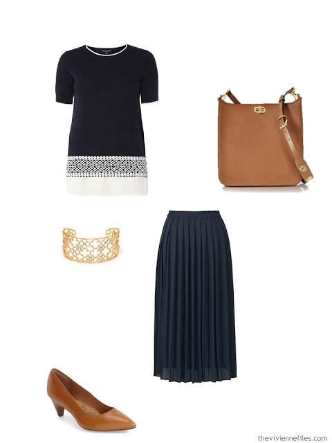 navy top and skirt with brown leather accessories