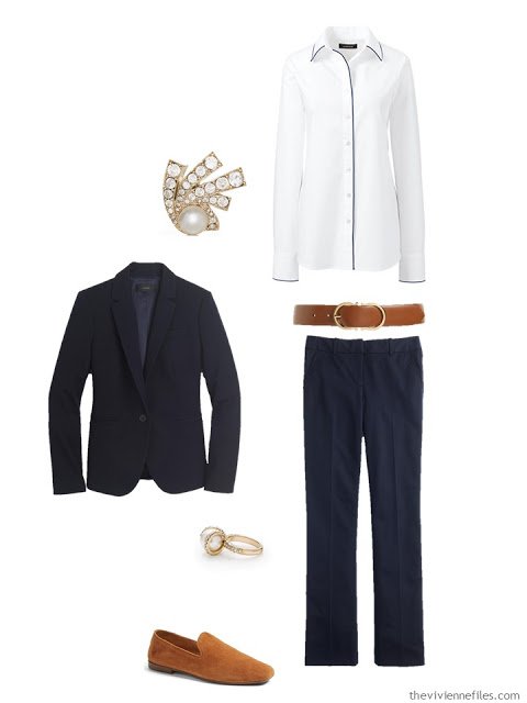 navy suit and white shirt with brown leather accessories