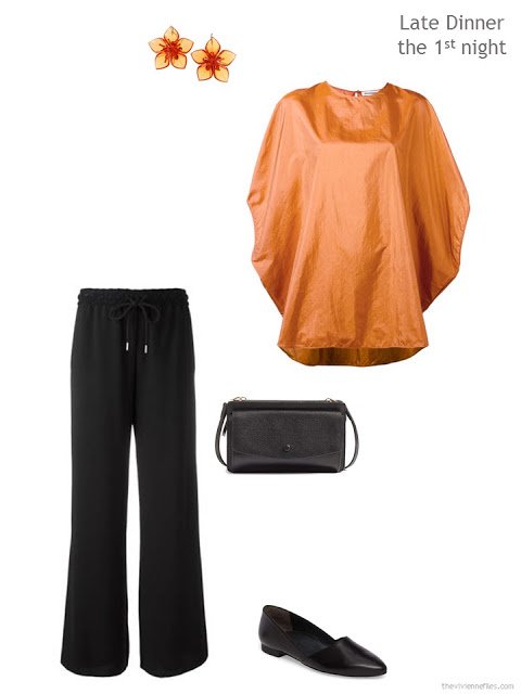 black trousers and softly draped pumpkin silk blouse