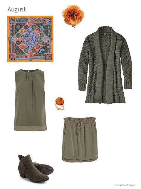 an olive skirt outfit with orange accessories