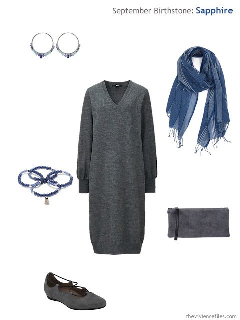 grey dress with sapphire jewelry