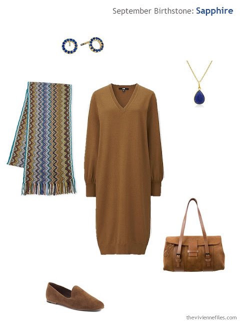 rust dress with sapphire jewelry