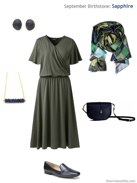 olive dress with sapphire jewelry