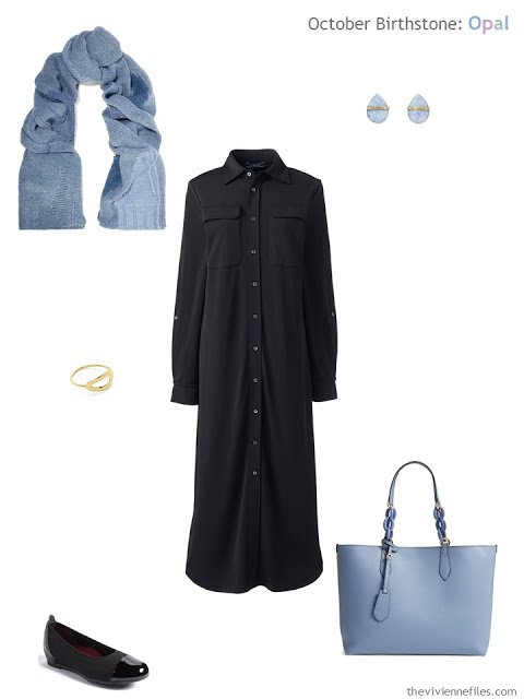 black shirtdress with blue opal earrings and blue accessories