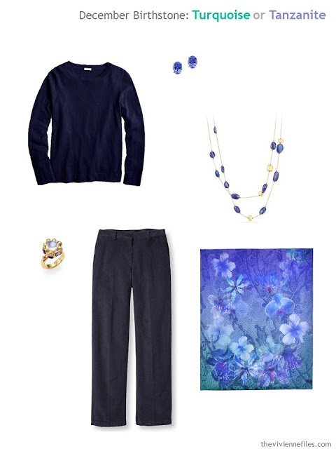 a navy outfit worn with tanzanite jewelry and a purple floral scarf