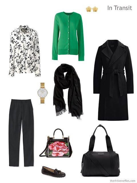 winter travel outfit in black, white and green