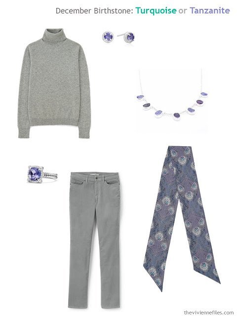 a grey outfit worn with tanzanite jewelry and a peacock print scarf