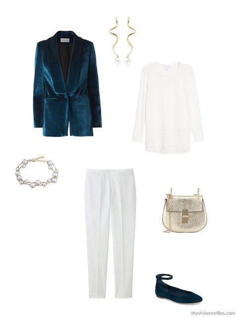 a holiday outfit in winter white with teal accents