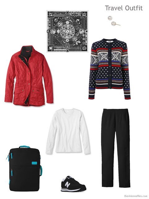 a travel outfit in black, white and red for cold weather