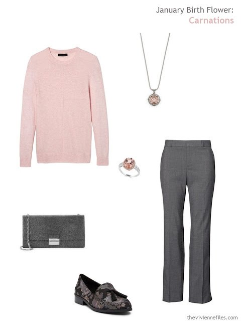 wearing a carnation pink sweater with grey