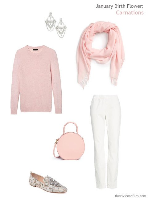 wearing a carnation pink sweater with off-white