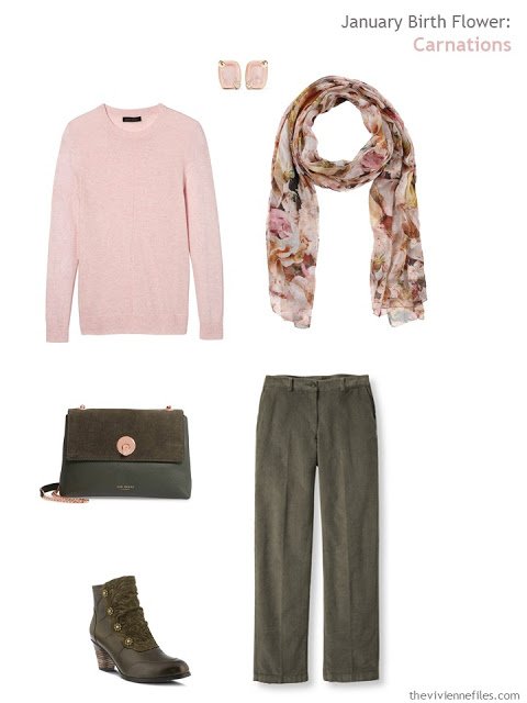 wearing a carnation pink sweater with olive green