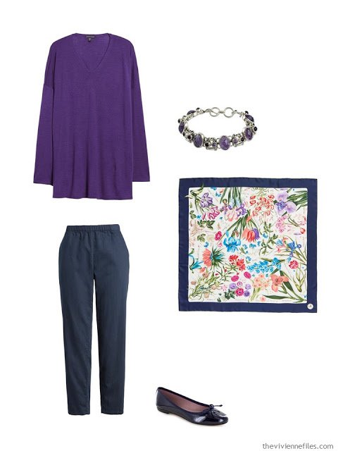 wearing an ultraviolet tunic with navy pants