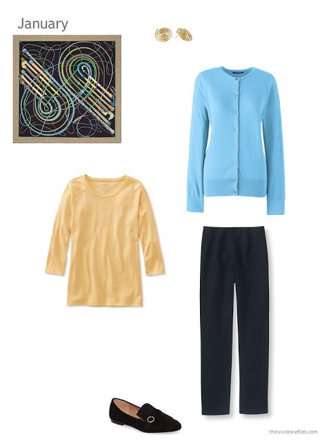 aqua blue cardigan, yellow tee shirt and black pants, united by an Hermes scarf