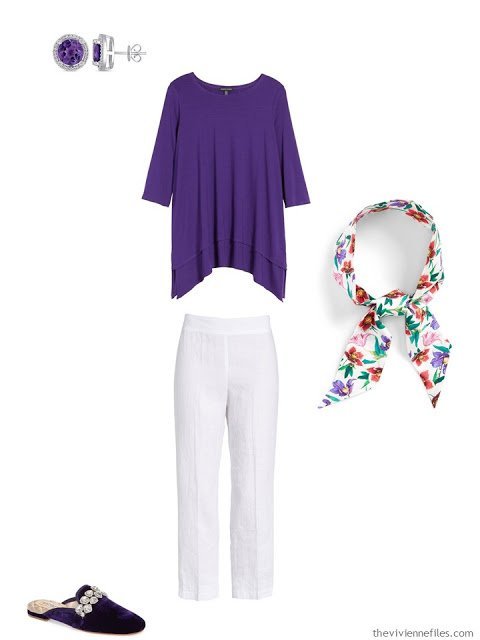 wearing an ultraviolet tunic with white linen pants