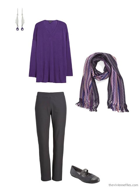 wearing an ultraviolet tunic with dark grey pants