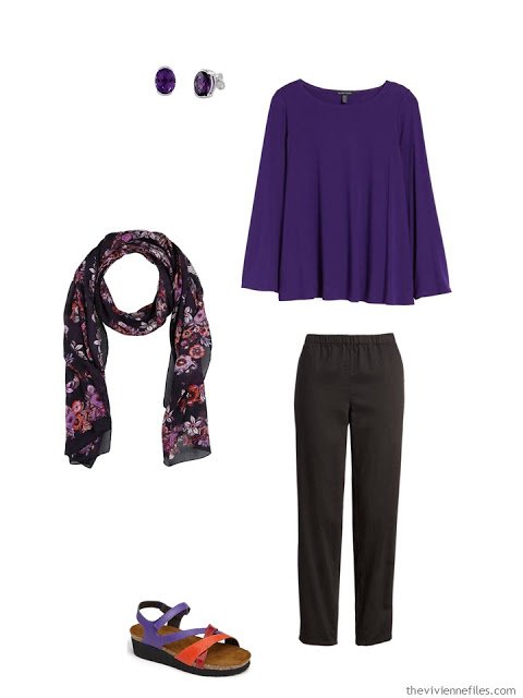 wearing an ultraviolet tunic with black cotton pants