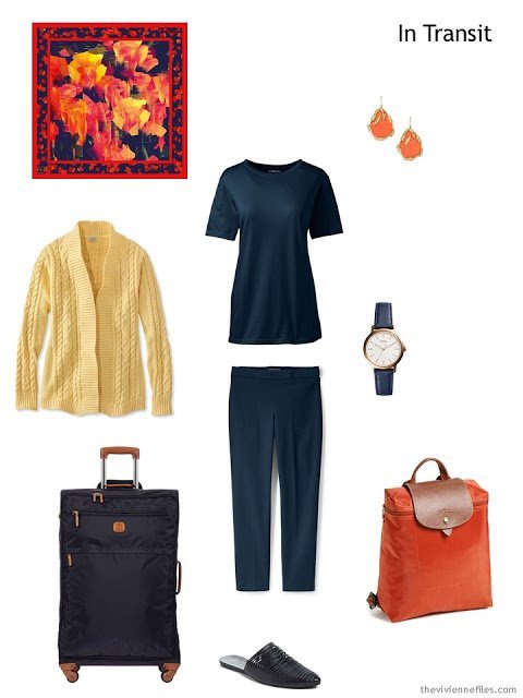 travel outfit in navy and yellow with orange accents