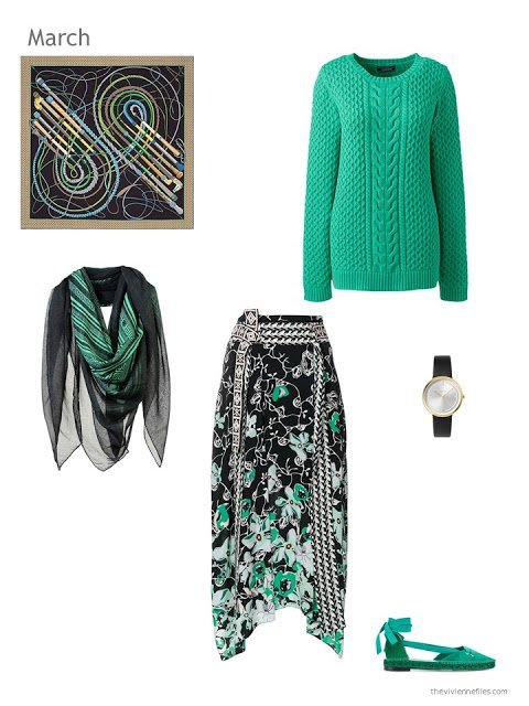 green sweater with a green, black and white skirt