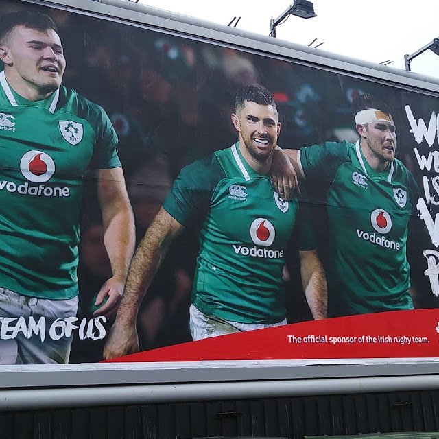 Vodafone billboard with Jacob Stockdale, Rob Kearney, and Peter O'Mahoney