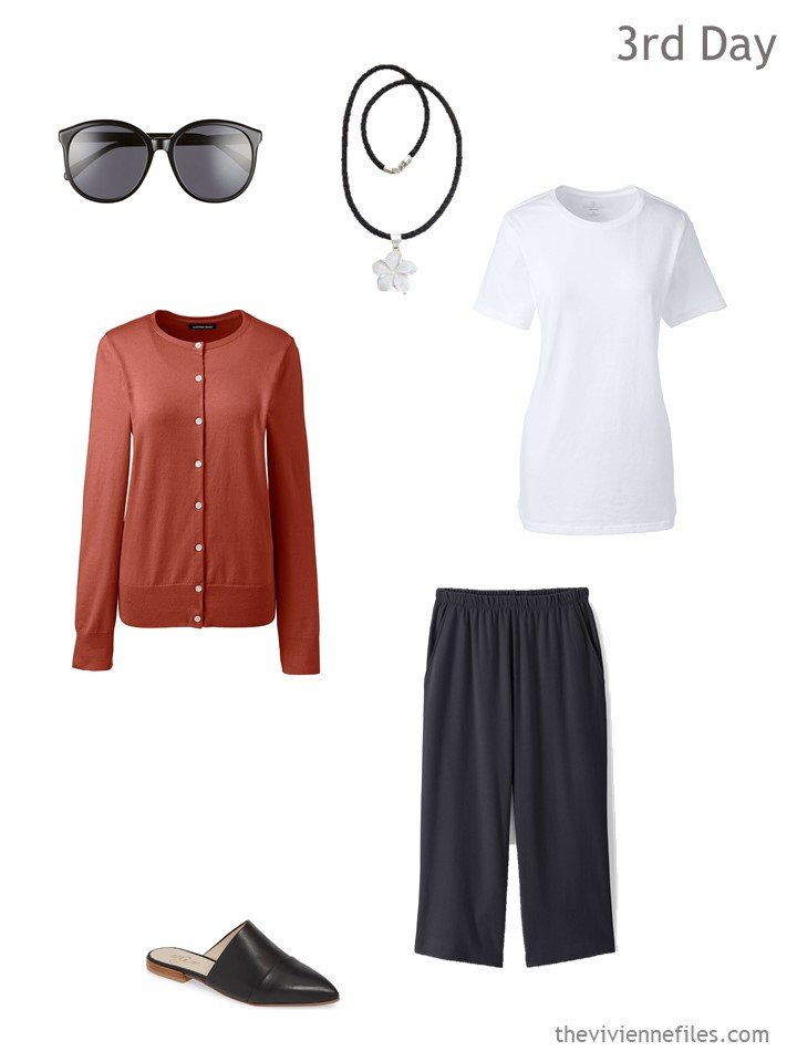 3. warm weather travel outfit in black, white and russet