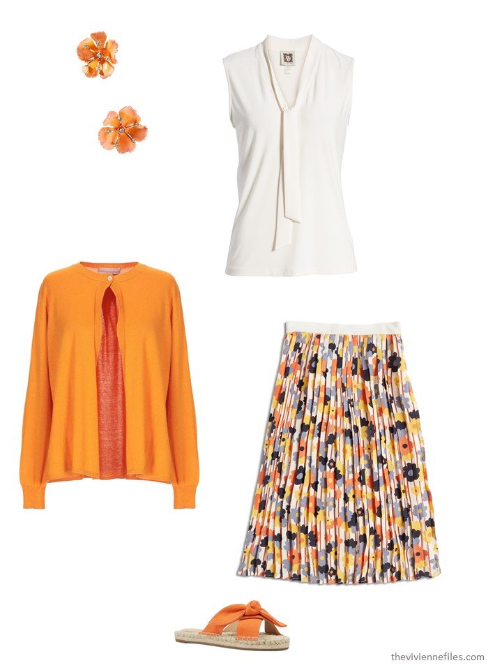 5. wearing a floral skirt with a sleeveless blouse and cardigan